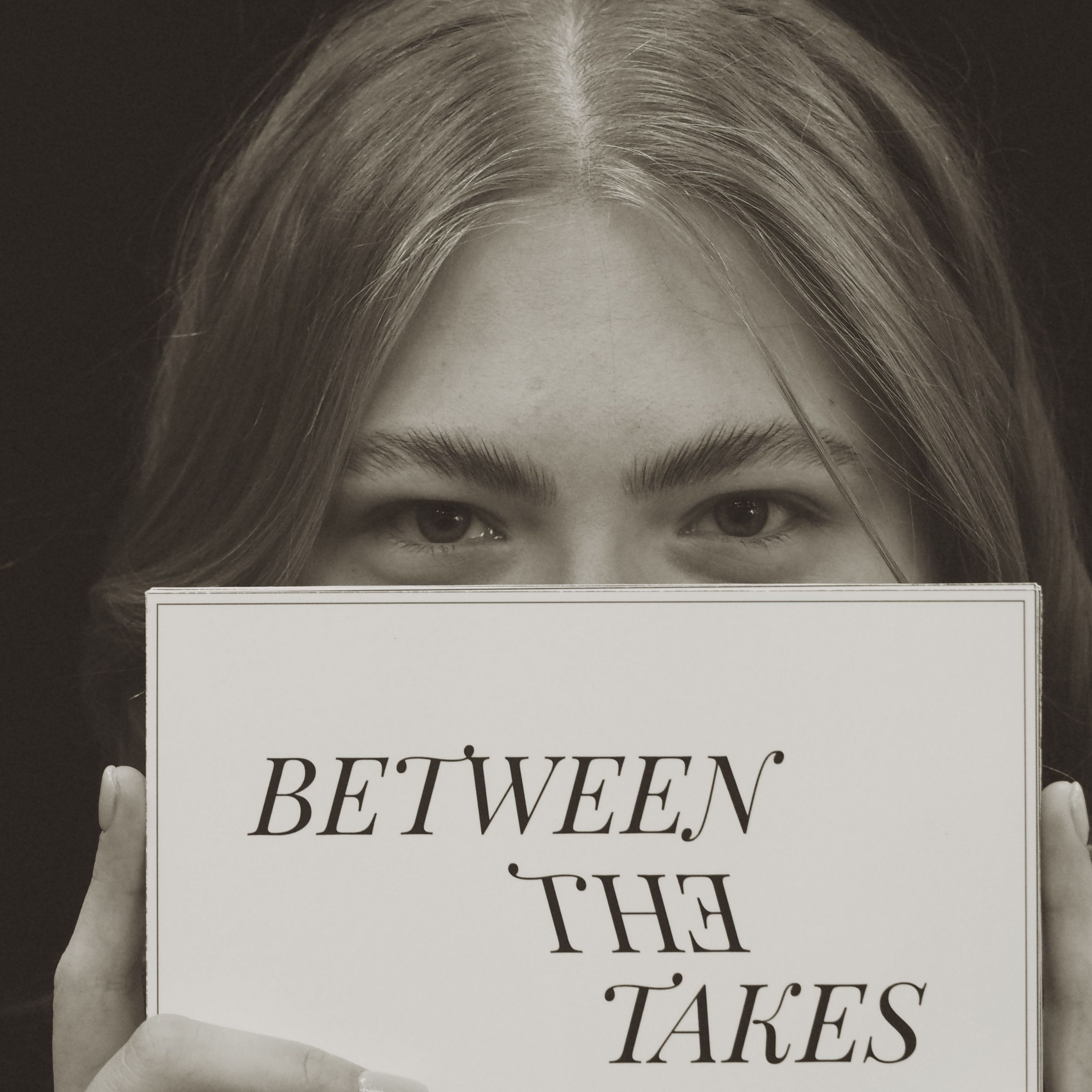 BETWEEN THE TAKES